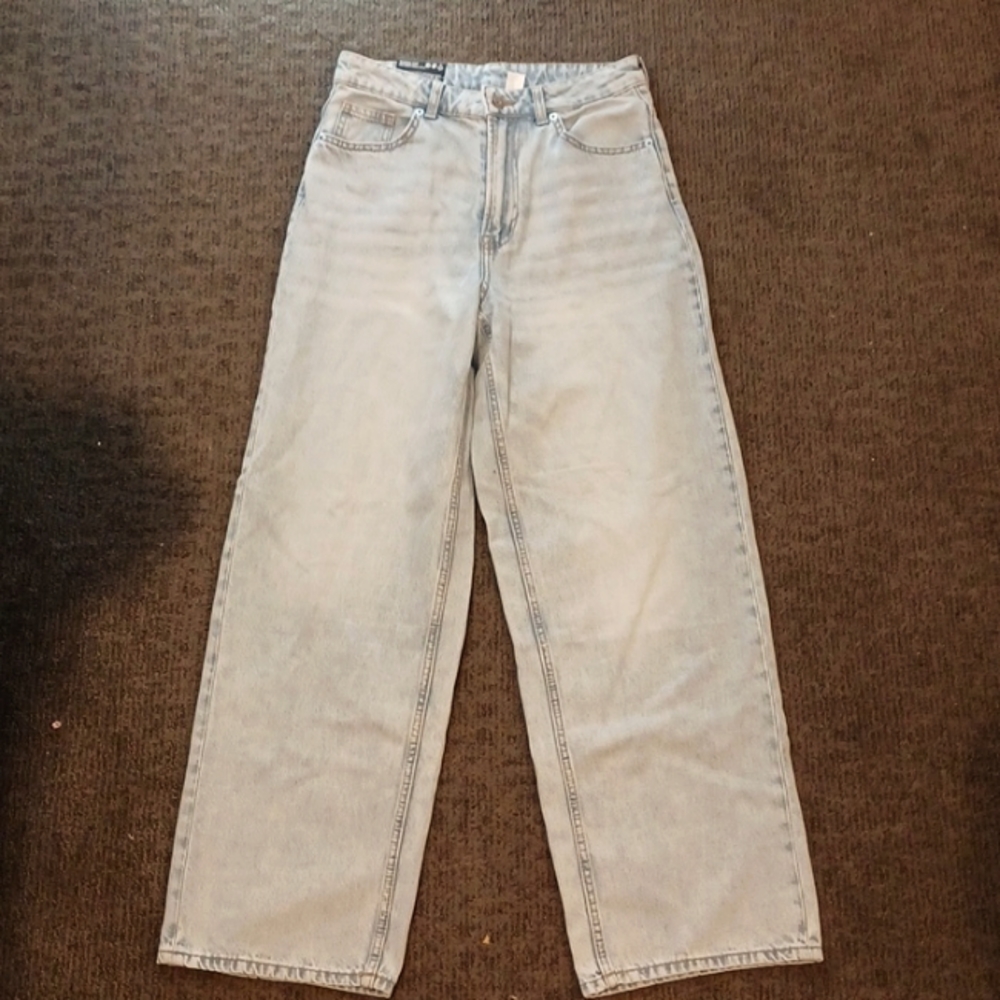 White washed, 90's baggy jeans. Never worn, tags still on.